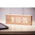 The Message Click Clock in beech will alternate between displaying the time, date, temperature and a special message. Allowing you to create and store up to seven different messages at once, you can choose whether to display the message continually or only when you click your fingers.  Boasting a stylish, wood-effect design, this clever clock also has five alarm settings and a dual power supply, whilst the internal battery will ensure the clock won't re-program each time it loses power. - L.M.  Features:    Message Click Clock  Alternates between displaying the time, date, temperature and message  Allows you to create and store up to 7 different messages at one time  Maximum amount of characters per message: 255  12/24 hour and &deg;C/F formats can be selected  5 alarm settings  Dual power supply: AC/DC 6V adapter (included) or 4 x AA 1.5 batteries  Sound sensitive function displays message at the click of your fingers (when powered by batteries)  Internal battery inside so when the clock loses power it won't be re-programmed  Stylish wood-effect design  Weight: 600g  Dimensions: H:6.5 x L:22 x D:10cm