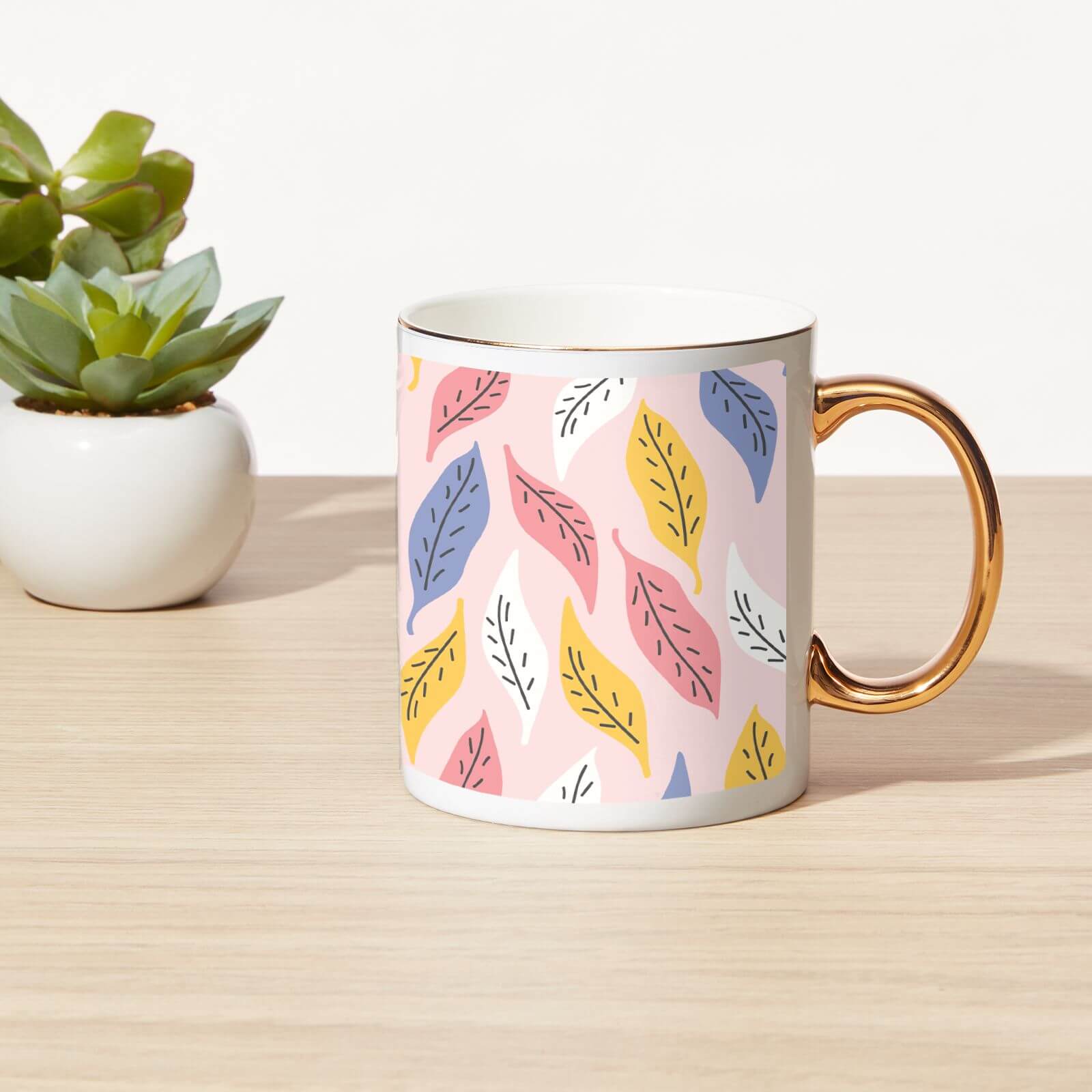 Multi Coloured Leaves Bone China Gold Handle Mug