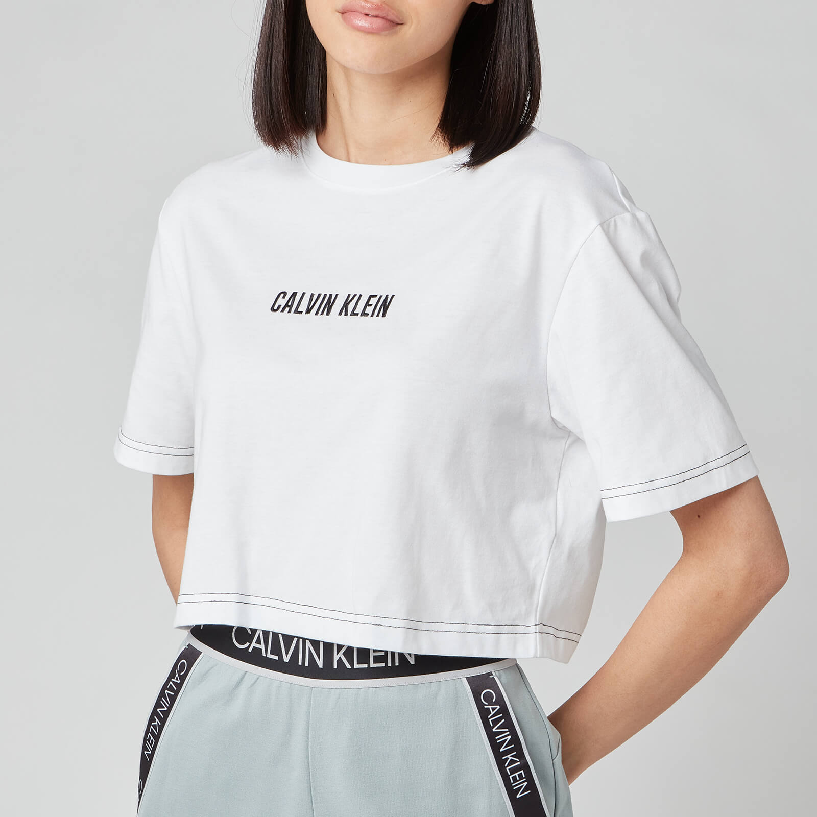 Calvin Klein Performance Women's Open Back Cropped Short Sleeve T-Shirt - Bright White - M