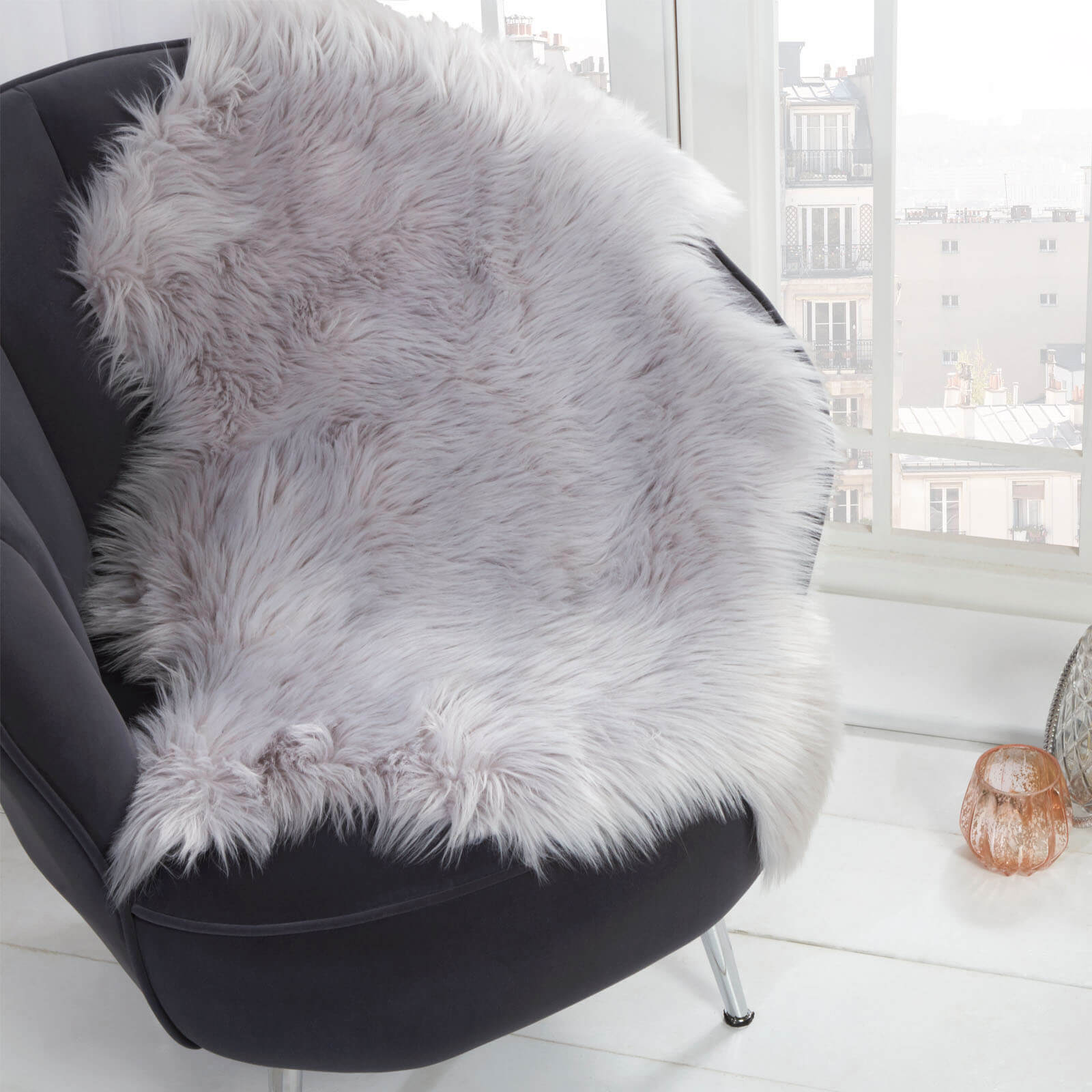 Click to view product details and reviews for Silver Faux Fur Sheepskin Rug.