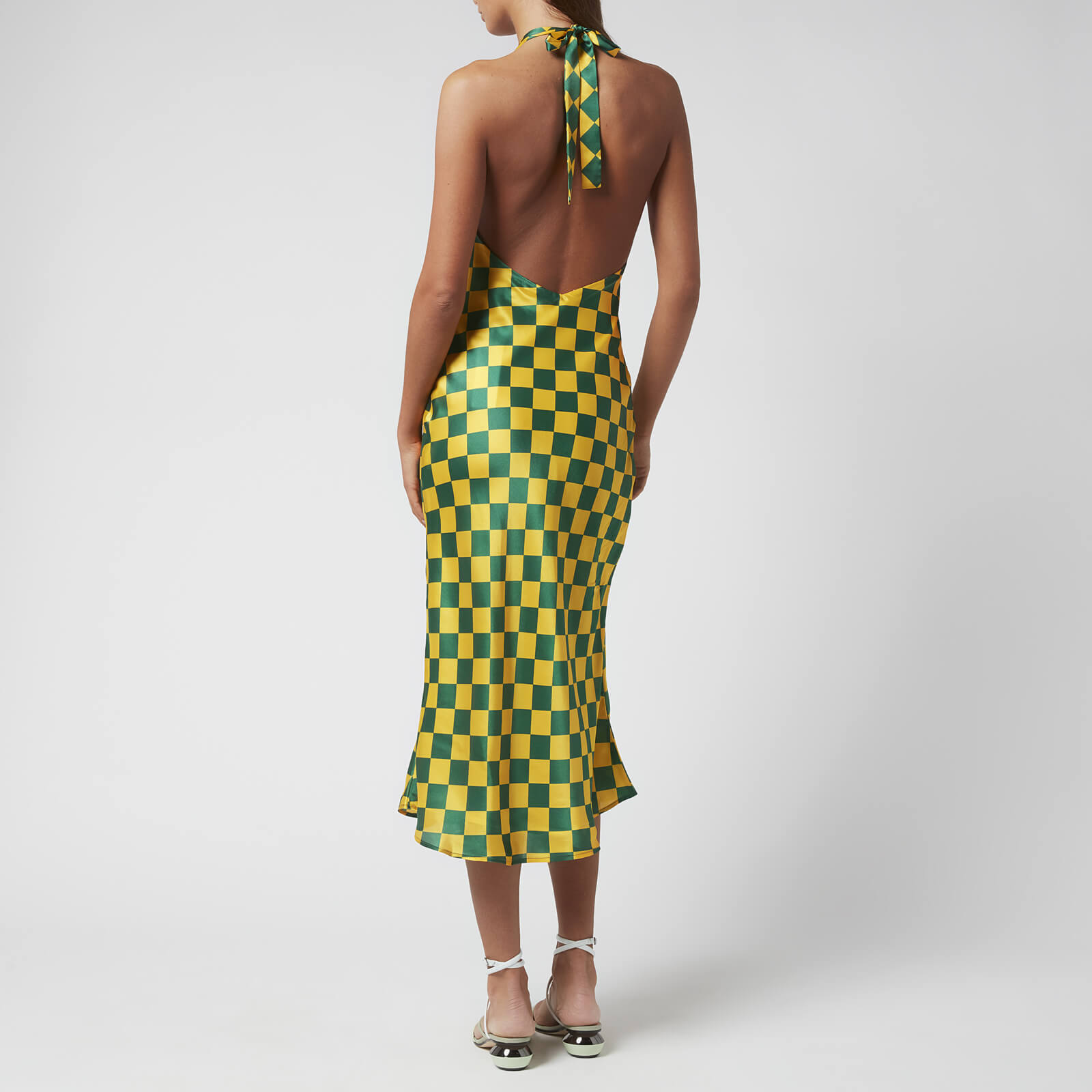 Artikel klicken und genauer betrachten! - Olivia Rubin invigorates her Emmy dress with a larger-than-life green and yellow check print. Featuring an elegant halterneck, the backless midi is cut from silk-satin on the bias for a flowing and feminine silhouette that skims your figure. Pair with chunky boots for a striking daytime edit. | im Online Shop kaufen