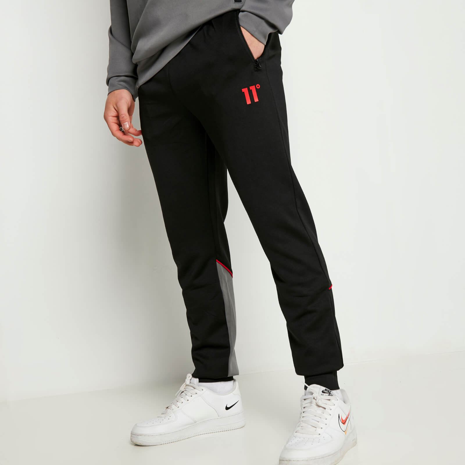 11 degrees cut and sew piped track pants – black/charcoal/ski patrol red - xs
