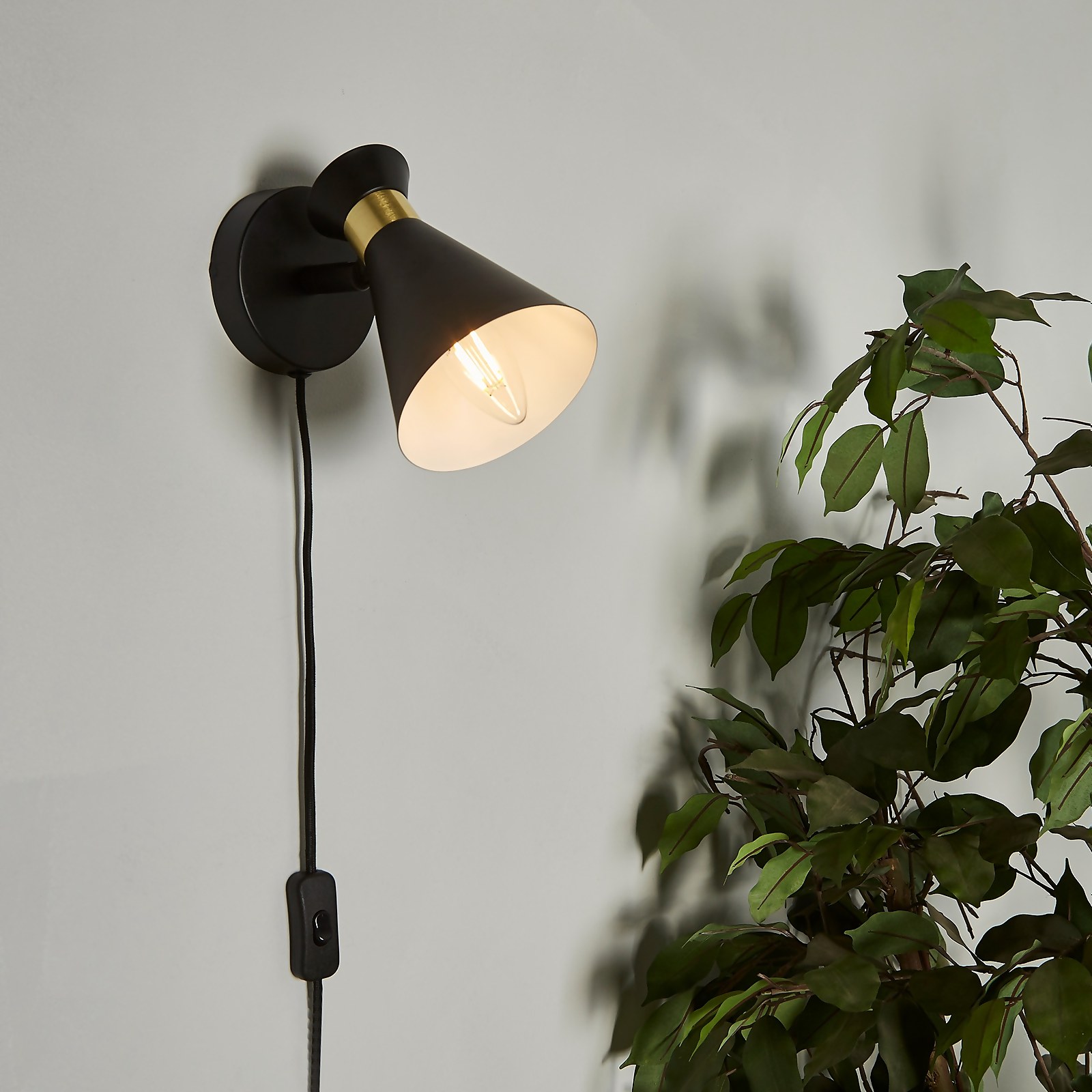 Photo of Balham Plug In Wall Light - Black & Brass