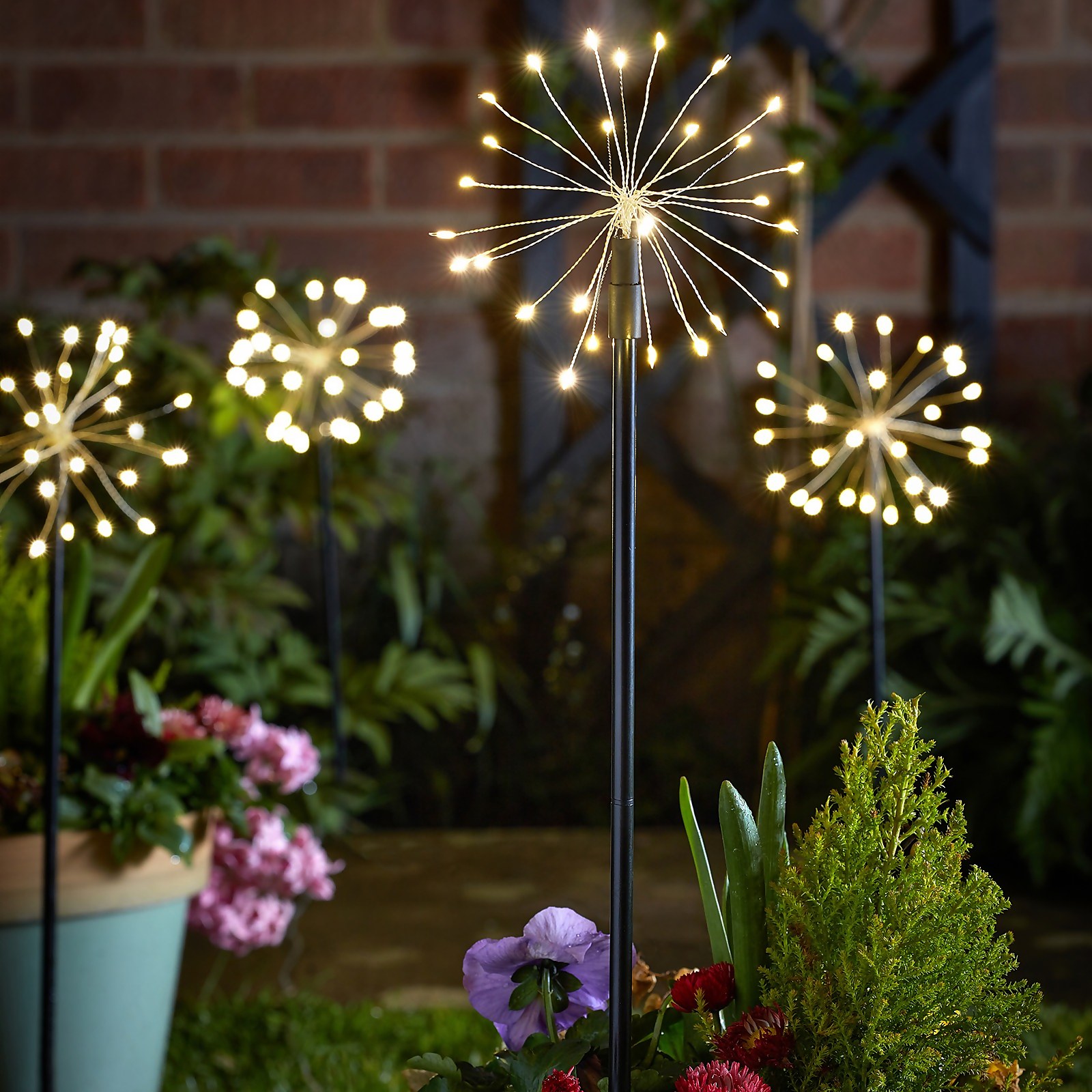 Photo of Set Of 4 Starburst Garden Stake Lights