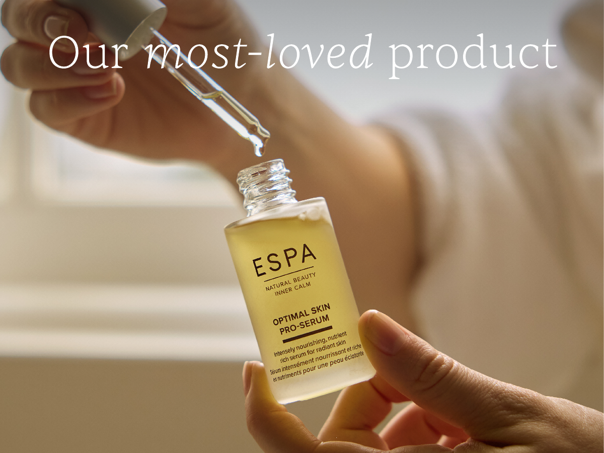 Out most-loved product. Image of Optimal Skin Pro Serum with pipette out of bottle
