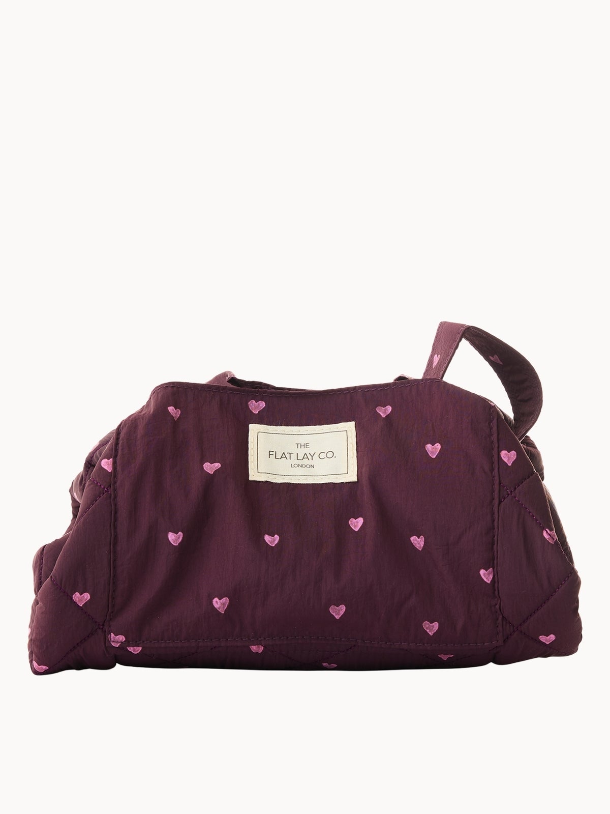 The Flat Lay Co. Parachute Drawstring Flat Lay Makeup Bag - Burgundy Hearts LOOKFANTASTIC EXCLUSIVE