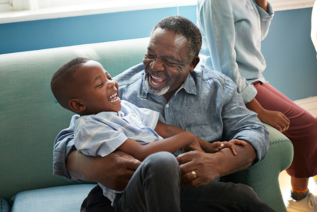 Image of a man and child laughing