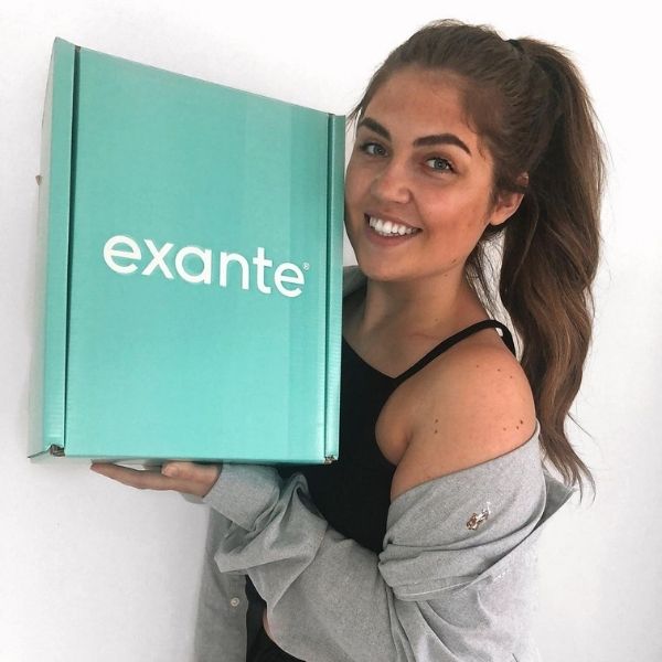 An influencer holding our 4 week diet box